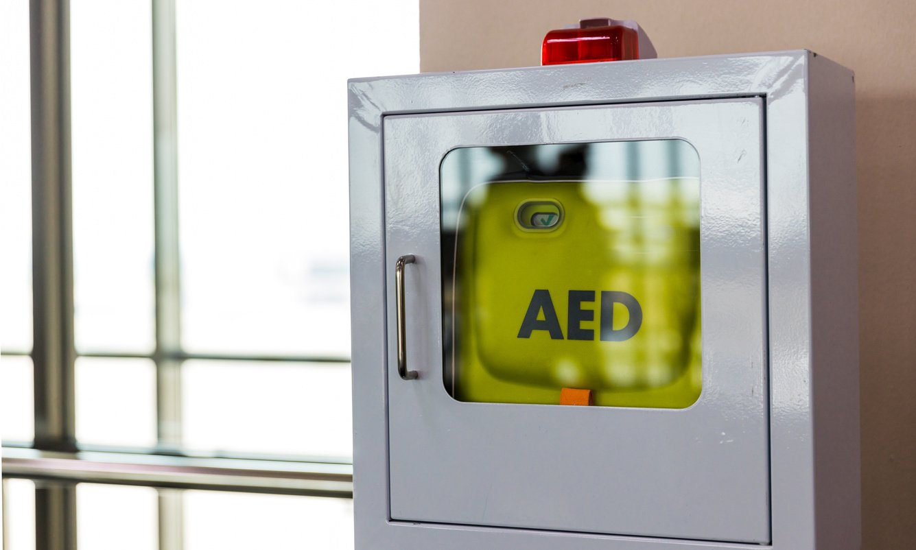 First aid box cardiopulmonary resuscitation using automated external defibrillator device, AED. First aid box for safety reason at Airport.